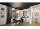 Chic dining room with a round table, velvet chairs, and elegant lighting fixture at 438 Southland Cir, Canton, GA 30115