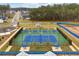 Aerial view of tennis courts in a beautiful community, surrounded by lush trees at 438 Southland Cir, Canton, GA 30115