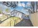 The backyard features a newly constructed wooden fence and a small patio at 6042 Creekford Dr, Lithonia, GA 30058