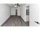 Open-concept living area with modern flooring, neutral paint, and great natural light at 6042 Creekford Dr, Lithonia, GA 30058