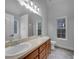 Bright bathroom with dual sinks, spacious vanity, and large mirror at 641 Morningside Dr, Stockbridge, GA 30281