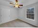 Bright bedroom with a ceiling fan and natural light from the window at 641 Morningside Dr, Stockbridge, GA 30281