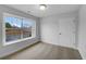 Well-lit bedroom with carpet, a large window and a neutral color palette at 641 Morningside Dr, Stockbridge, GA 30281