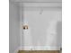 A bright laundry room with tile floor and white walls with washer and dryer hookups at 641 Morningside Dr, Stockbridge, GA 30281