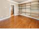 Spacious bedroom features hardwood floors, walk-in closet, and an ensuite bathroom at 789 Liberty Commons Nw Dr, Atlanta, GA 30314