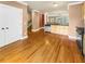 Open kitchen features stainless steel appliances, wooden cabinets, and hardwood floors at 789 Liberty Commons Nw Dr, Atlanta, GA 30314