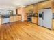 Spacious kitchen with stainless steel appliances and hardwood floors at 789 Liberty Commons Nw Dr, Atlanta, GA 30314