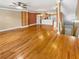 Open living room features hardwood floors and an open floor plan at 789 Liberty Commons Nw Dr, Atlanta, GA 30314