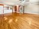 Expansive living area with gleaming hardwood floors and a ceiling fan at 789 Liberty Commons Nw Dr, Atlanta, GA 30314