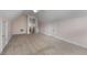 Large attic space with three doors and a window at 155 Rose Creek Dr, Covington, GA 30014