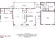 Detailed floor plan showcasing layout of first floor with kitchen, bedrooms, and living spaces at 545 Highway 155 N, Mcdonough, GA 30253