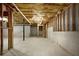 Unfinished basement with visible framework and concrete floor at 63 Avery Way, Dallas, GA 30157