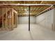 Spacious unfinished basement featuring concrete walls and open layout at 63 Avery Way, Dallas, GA 30157