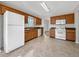 Functional kitchen with white appliances and ample cabinet space at 63 Avery Way, Dallas, GA 30157