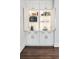 A custom pantry with cabinet lighting and interior organizational space at 9465 Mistwater Close, Roswell, GA 30076