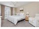 This bedroom has carpet, neutral walls, and a bright window at 1323 Weatherstone Ne Way, Atlanta, GA 30324