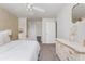 This bedroom has carpet, neutral walls, and white dresser at 1323 Weatherstone Ne Way, Atlanta, GA 30324