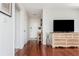 Modern entryway with a view of the front door, beautiful hardwood floors, and stylish decor at 1323 Weatherstone Ne Way, Atlanta, GA 30324