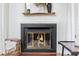 Cozy fireplace with decorative mantel and hearth, perfect for adding warmth to the living space at 1323 Weatherstone Ne Way, Atlanta, GA 30324