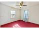 Bedroom featuring carpet flooring, bright windows, and a ceiling fan at 162 Fairburn Sw Rd, Atlanta, GA 30331