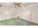 Bedroom with neutral walls, green carpet, and bright natural light at 162 Fairburn Sw Rd, Atlanta, GA 30331