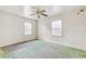 Bedroom featuring carpet flooring, bright windows, and a ceiling fan at 162 Fairburn Sw Rd, Atlanta, GA 30331