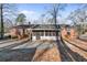 Charming single-story brick home with a large front yard and a screened-in back porch at 162 Fairburn Sw Rd, Atlanta, GA 30331