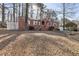 Charming single-story brick home with an arched entryway and a well-manicured front yard at 162 Fairburn Sw Rd, Atlanta, GA 30331