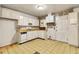 Kitchen area with neutral cabinets, patterned flooring and vintage appliances at 162 Fairburn Sw Rd, Atlanta, GA 30331