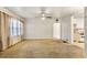 Spacious living room featuring carpet flooring and a bright window at 162 Fairburn Sw Rd, Atlanta, GA 30331