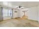 Spacious living room featuring carpet flooring and a bright window at 162 Fairburn Sw Rd, Atlanta, GA 30331