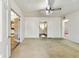 Empty living room with carpet flooring and a view to the kitchen at 162 Fairburn Sw Rd, Atlanta, GA 30331