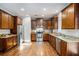 Spacious kitchen featuring stainless appliances, granite countertops and lots of wood cabinets for maximum storage at 305 Deep Step Rd, Covington, GA 30014