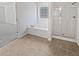 Relaxing bathroom featuring a shower and a luxurious soaking tub for ultimate comfort at 5692 Greensage Dr, Atlanta, GA 30349