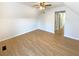 Bedroom features neutral walls, a ceiling fan, and a doorway leading to another room or hallway at 949 Bobcat Se Ct, Marietta, GA 30067