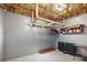 Unfinished basement area with storage shelves and wall organization features at 1090 Fountain Head Ln, Lawrenceville, GA 30043