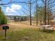 Community picnic area beside the pond, perfect for outdoor dining and socializing at 1090 Fountain Head Ln, Lawrenceville, GA 30043