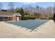 Community pool with tables and chairs, covered for the season and ready for summer fun at 1090 Fountain Head Ln, Lawrenceville, GA 30043