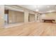 Basement living area with hardwood floors and access to a pool table and other living spaces at 2850 Brandy Ln, Cumming, GA 30041