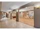 Basement living area with hardwood floors, recessed lighting, and access to the game room at 2850 Brandy Ln, Cumming, GA 30041