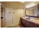 Well-lit bathroom with a glass shower, updated vanity, and modern fixtures at 2850 Brandy Ln, Cumming, GA 30041