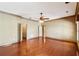Spacious main bedroom featuring hardwood floors, neutral walls and a ceiling fan at 2850 Brandy Ln, Cumming, GA 30041
