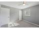Relaxing bedroom featuring neutral walls and cozy carpeting, creating a comfortable and peaceful escape at 10152 Griffin Sw Ln, Covington, GA 30014