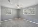 Bright bedroom filled with natural light, featuring neutral carpeting for a calming and airy feel at 10152 Griffin Sw Ln, Covington, GA 30014