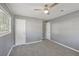 Serene bedroom with modern paint and soft carpeting, offering a tranquil and inviting space at 10152 Griffin Sw Ln, Covington, GA 30014
