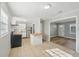 Open concept kitchen with updated stainless steel appliances and ample counter space at 10152 Griffin Sw Ln, Covington, GA 30014