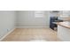 Open concept kitchen with updated stainless steel appliances and ample counter space at 10152 Griffin Sw Ln, Covington, GA 30014