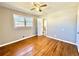 Bedroom featuring hardwood floors and a neutral paint scheme at 1091 Mountain View Nw Rd, Conyers, GA 30012