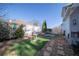 Charming backyard patio with comfortable seating, decorative stones and manicured landscaping at 210 Wrights Mill Way, Canton, GA 30115
