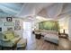 Finished basement living area with a comfortable sectional sofa and faux ceiling at 210 Wrights Mill Way, Canton, GA 30115